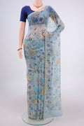 Sky Blue Mysore Chiffon Saree with Floral Print on the body and Thin Zari Line.  displayed on a mannequin