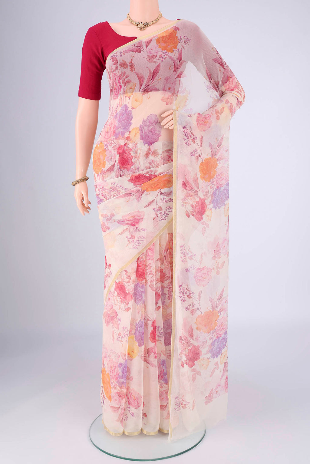 Off White Mysore Chiffon Saree with Floral Print on the body and Thin Zari Line.  displayed on a mannequin