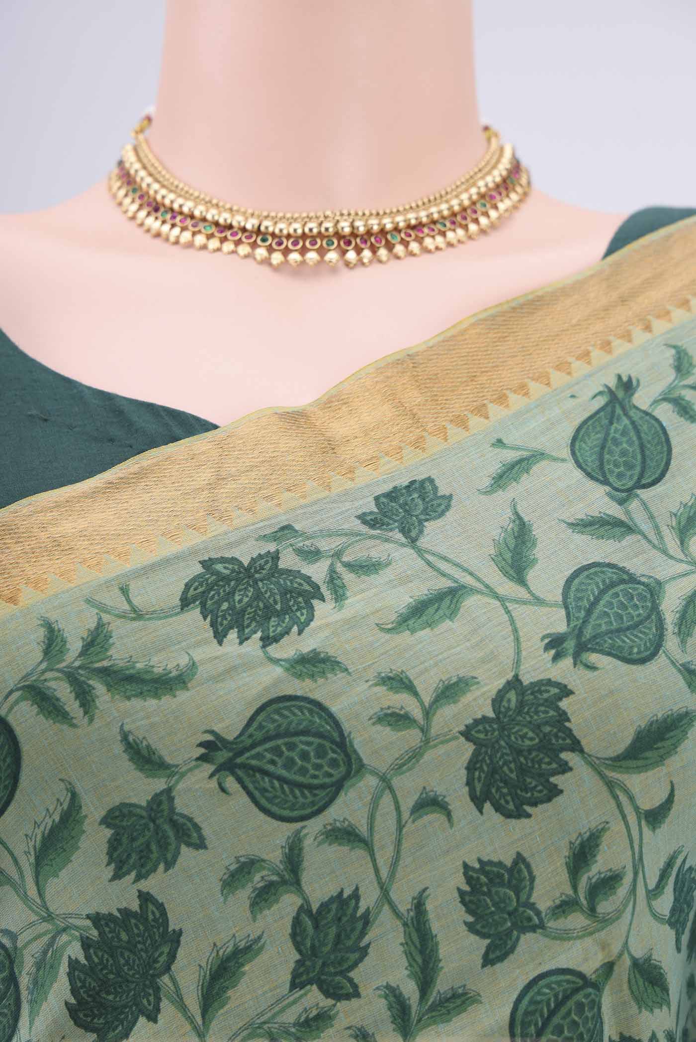 Border image of Green Mangalagiri Cotton Saree with Printed design on the body and Zari Border. 