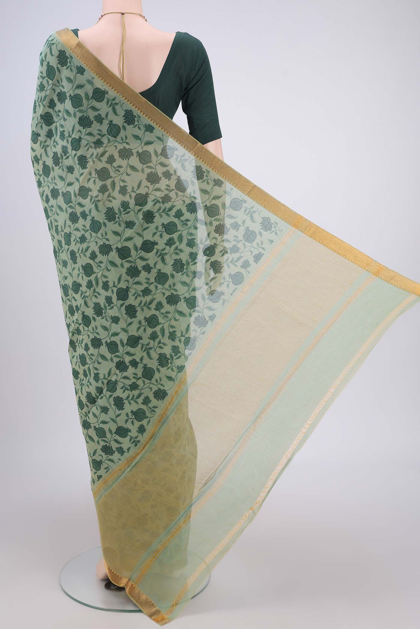 Flat view of Green Mangalagiri Cotton Saree with Printed design on the body and Zari Border. 