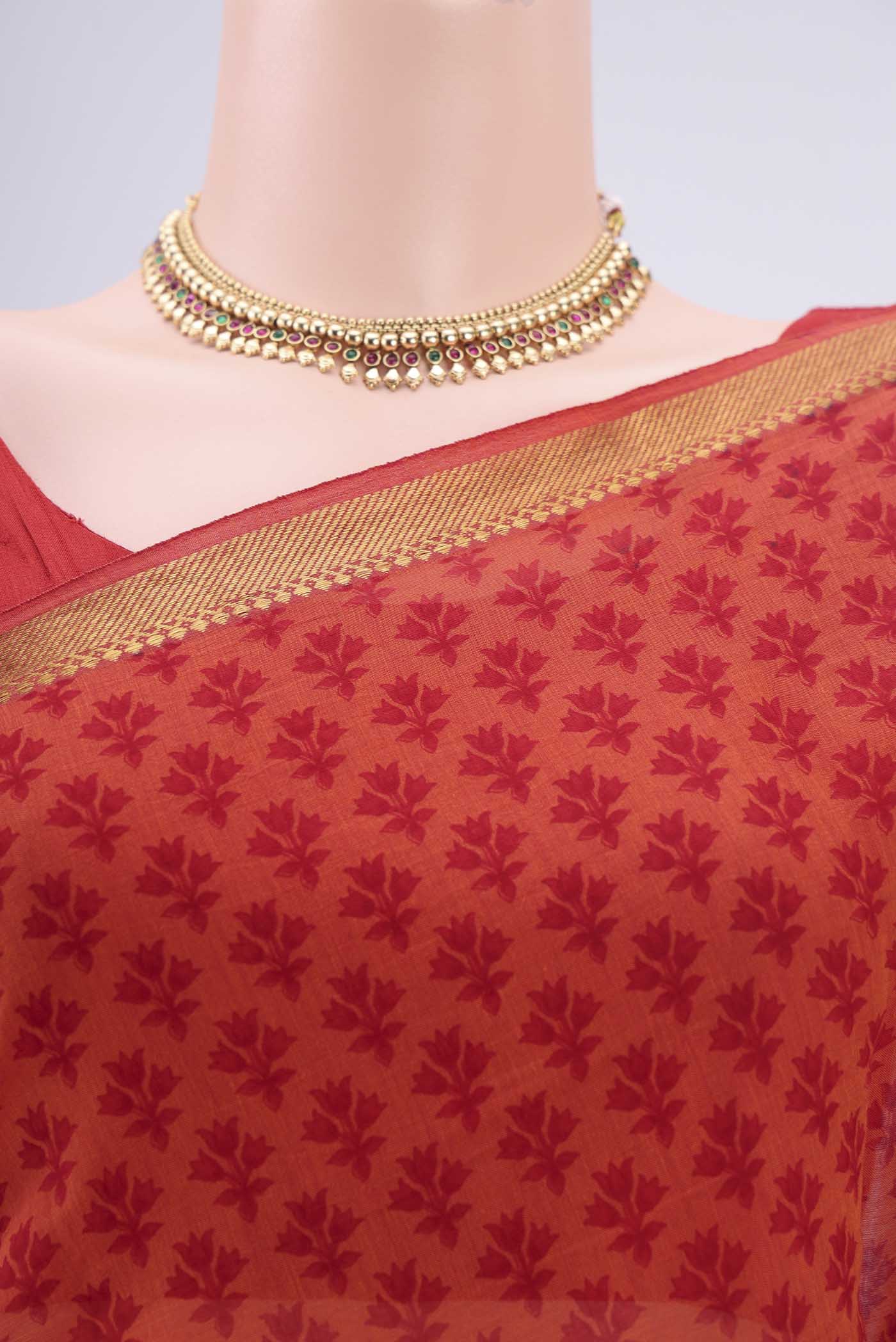 Border image of Saffron Mangalagiri Cotton Saree with Printed design on the body and Zari Border. 