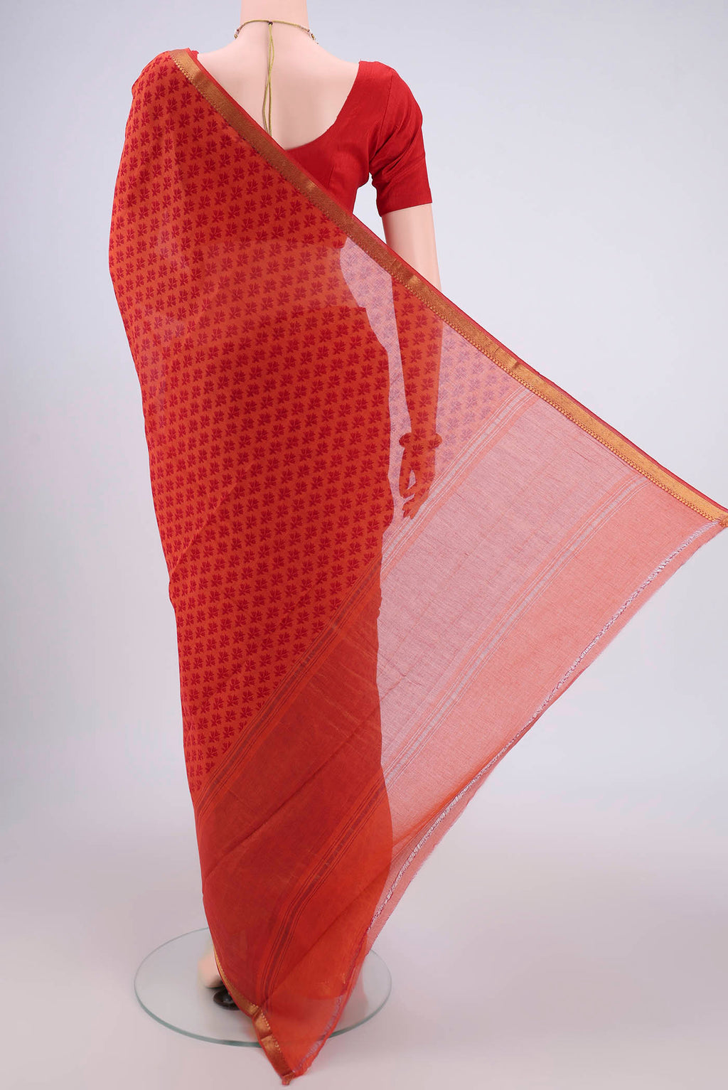 Flat view of Saffron Mangalagiri Cotton Saree with Printed design on the body and Zari Border. 