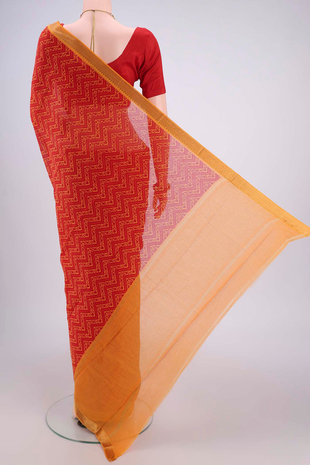 Flat view of Red Mangalagiri Cotton Saree with Printed design on the body and Zari Border. 