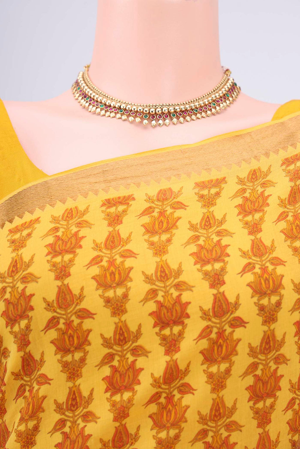 Border image of Yellow Mangalagiri Cotton Saree with Printed design on the body and Zari Border. 