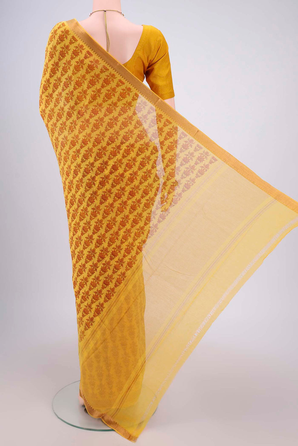 Flat view of Yellow Mangalagiri Cotton Saree with Printed design on the body and Zari Border. 