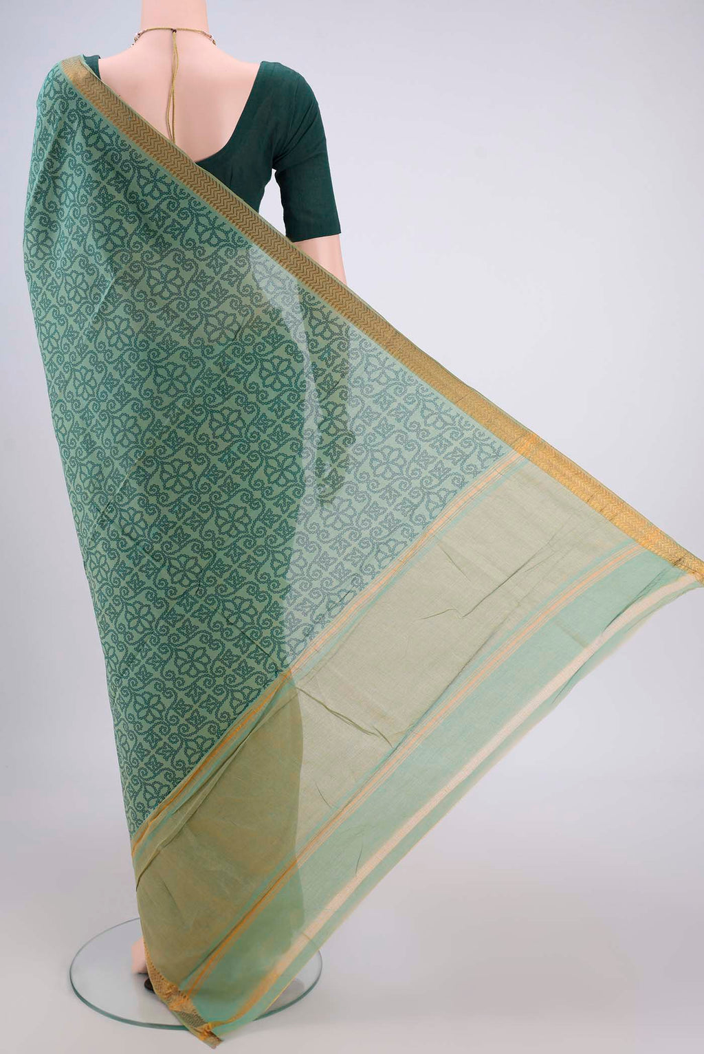 Flat view of Light Green Mangalagiri Cotton Saree with Printed design on the body and Zari Border. 