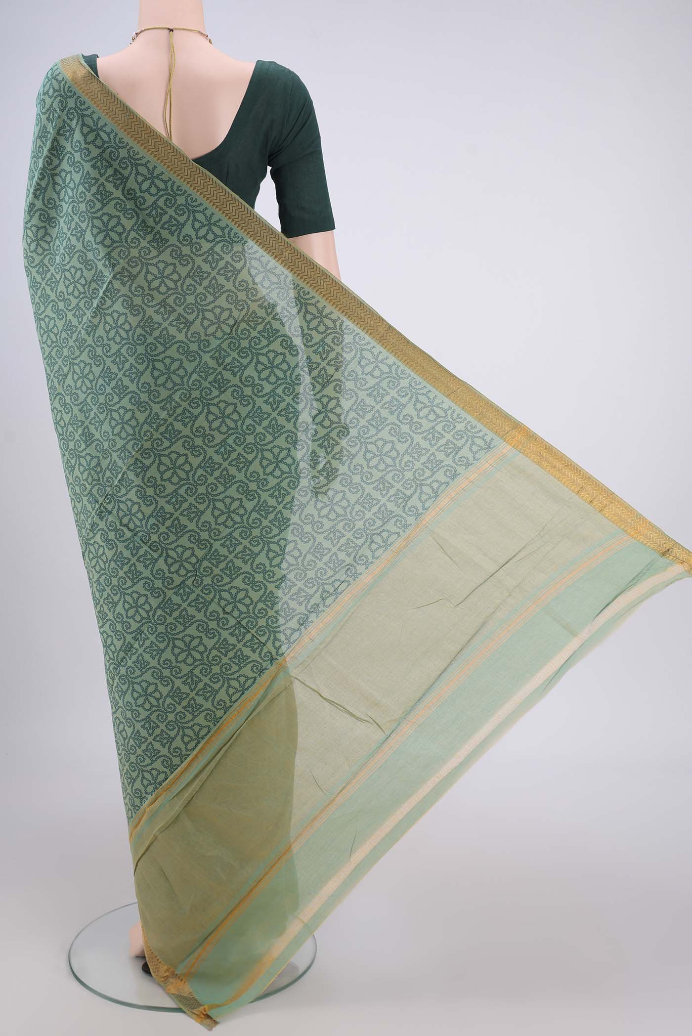 Flat view of Light Green Mangalagiri Cotton Saree with Printed design on the body and Zari Border. 