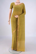 Mehandi Green Mangalagiri Cotton Saree with Printed design on the body and Zari Border.  displayed on a mannequin