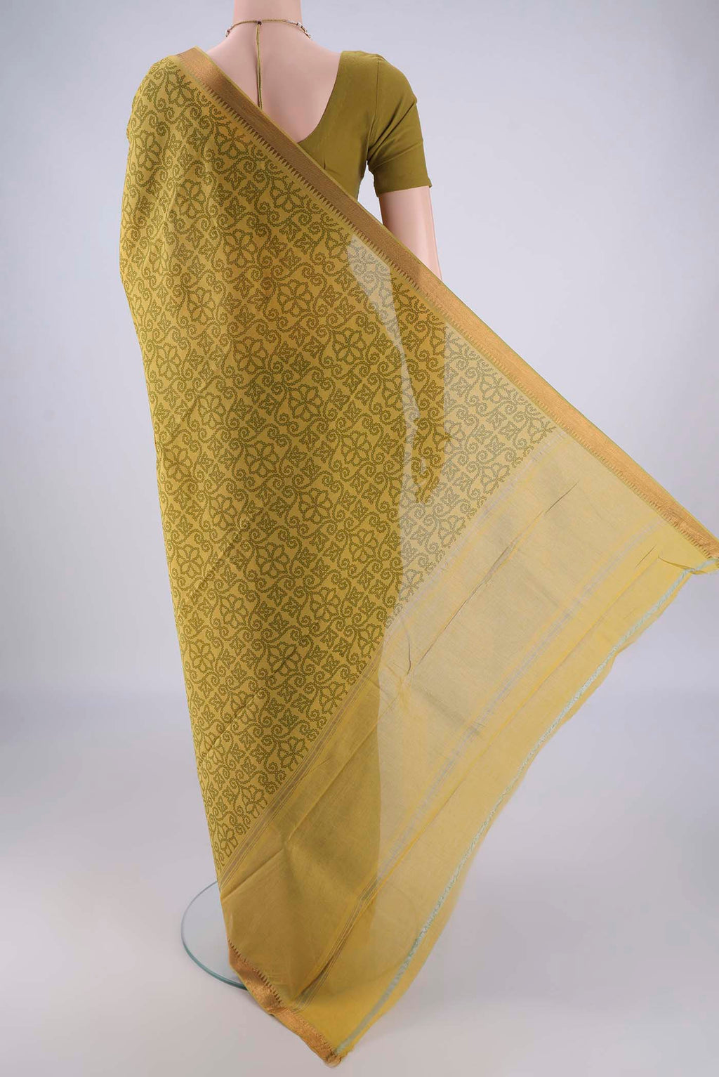 Flat view of Mehandi Green Mangalagiri Cotton Saree with Printed design on the body and Zari Border. 