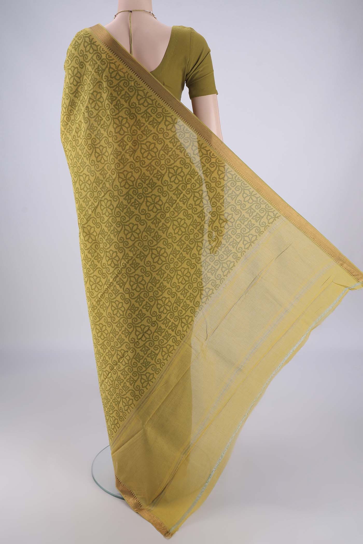 Flat view of Mehandi Green Mangalagiri Cotton Saree with Printed design on the body and Zari Border. 