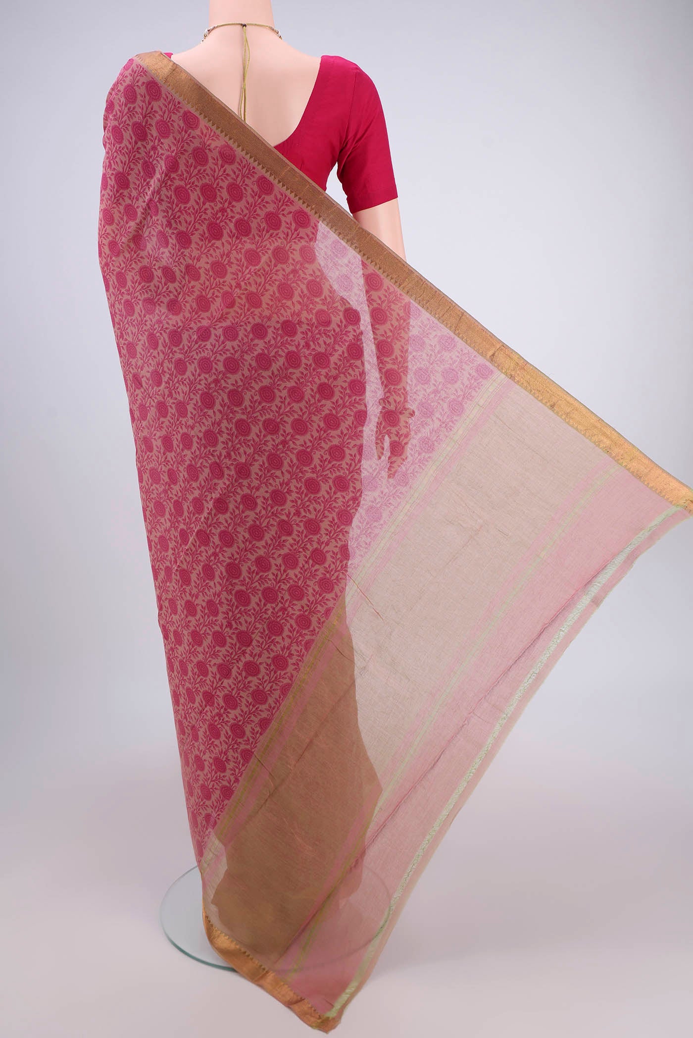 Flat view of Pink Mangalagiri Cotton Saree with Printed design on the body and Zari Border. 