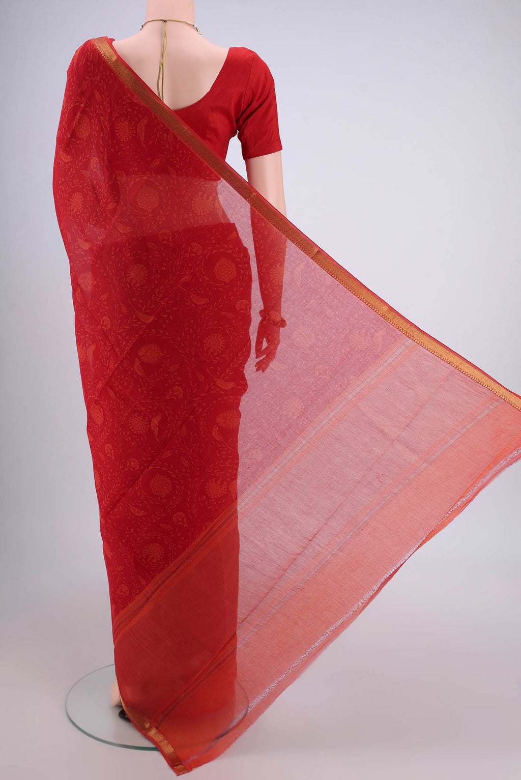 Flat view of Red Mangalagiri Cotton Saree with Printed design on the body and Zari Border. 