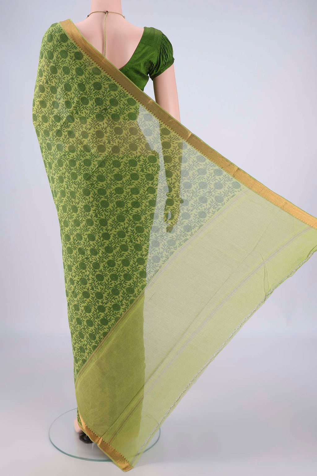 Flat view of Green Mangalagiri Cotton Saree with Printed design on the body and Zari Border. 