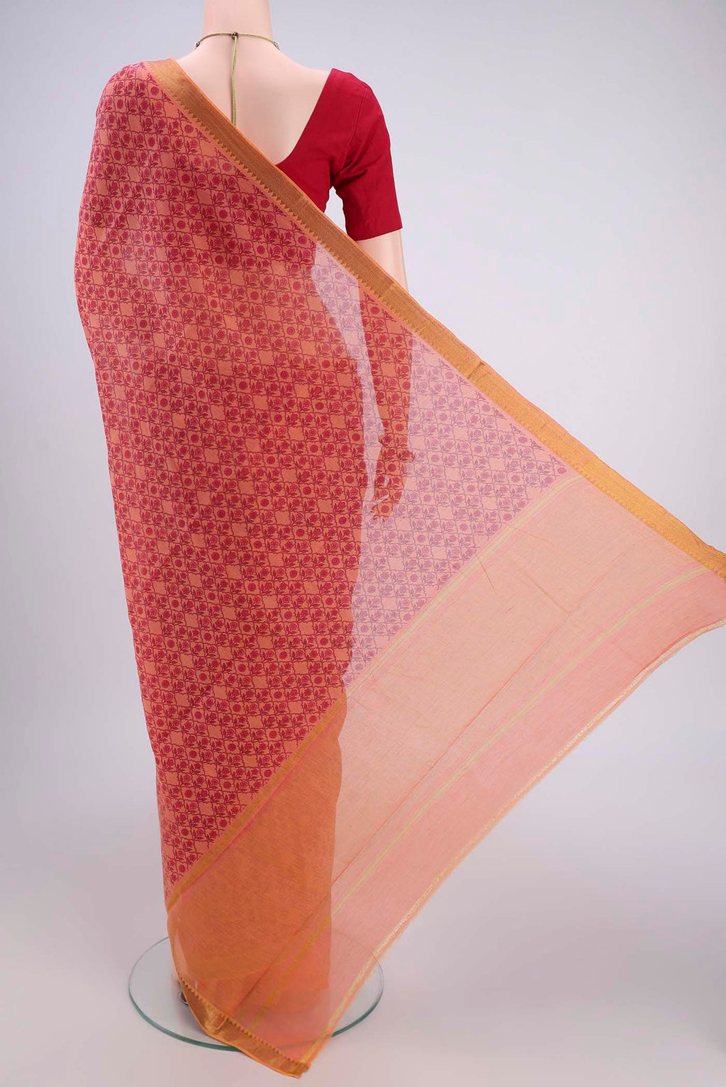 Flat view of Salmon Mangalagiri Cotton Saree with Printed design on the body and Zari Border. 