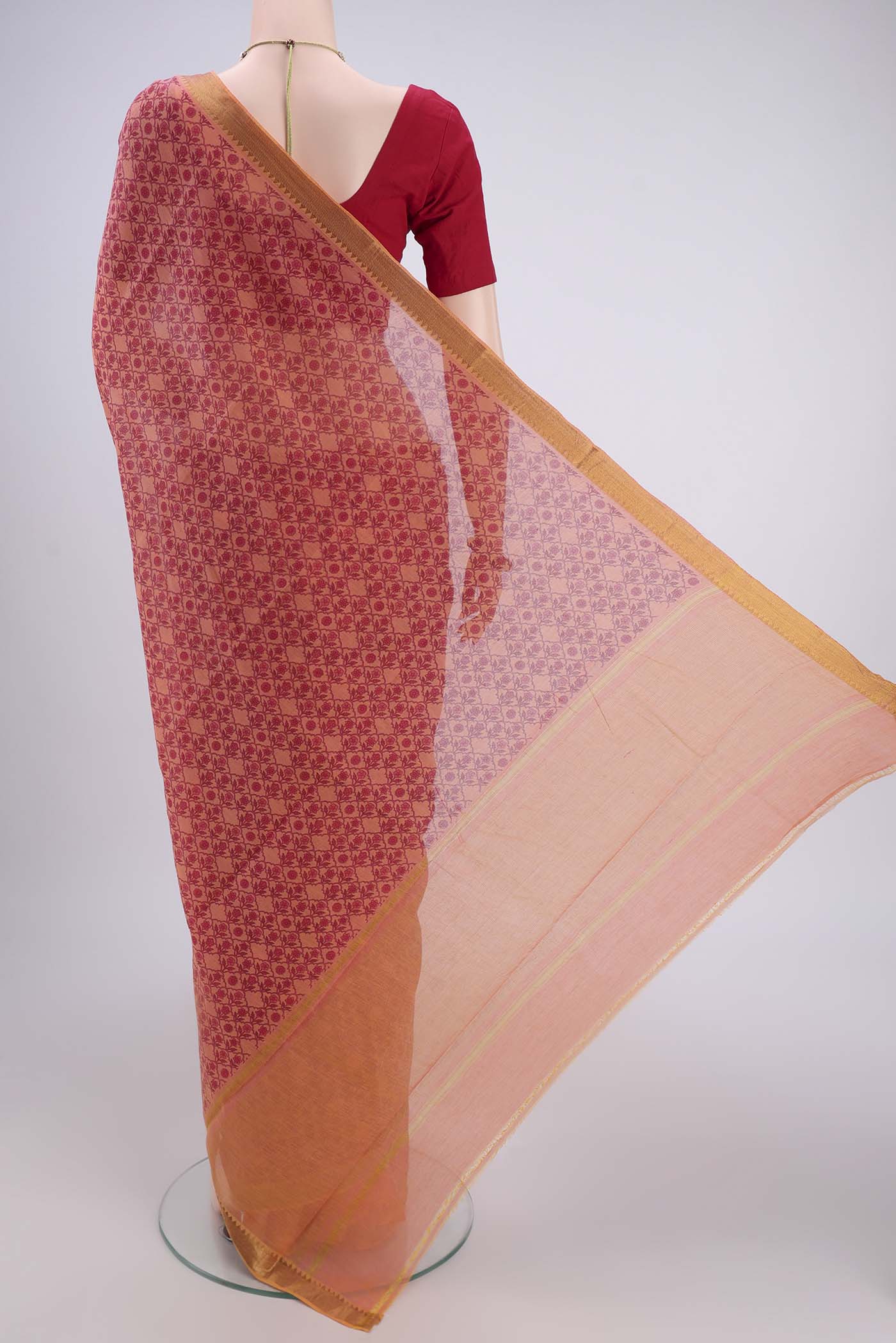 Flat view of Salmon Mangalagiri Cotton Saree with Printed design on the body and Zari Border. 