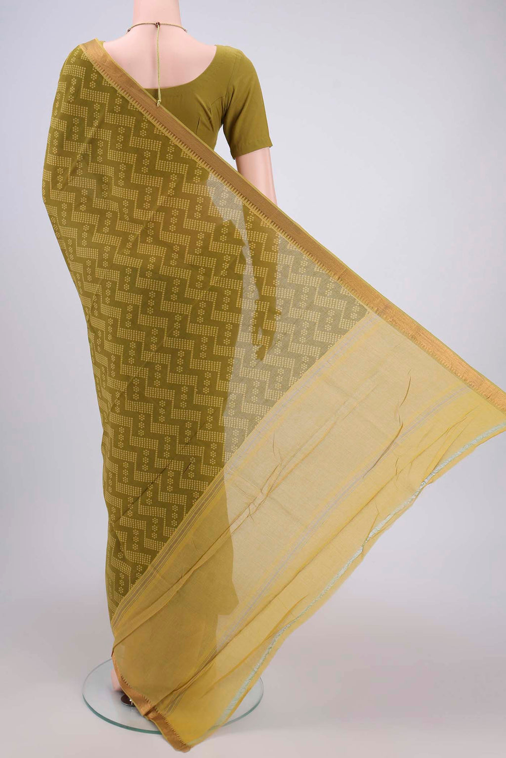 Flat view of Mehandi Green Mangalagiri Cotton Saree with Printed design on the body and Zari Border. 