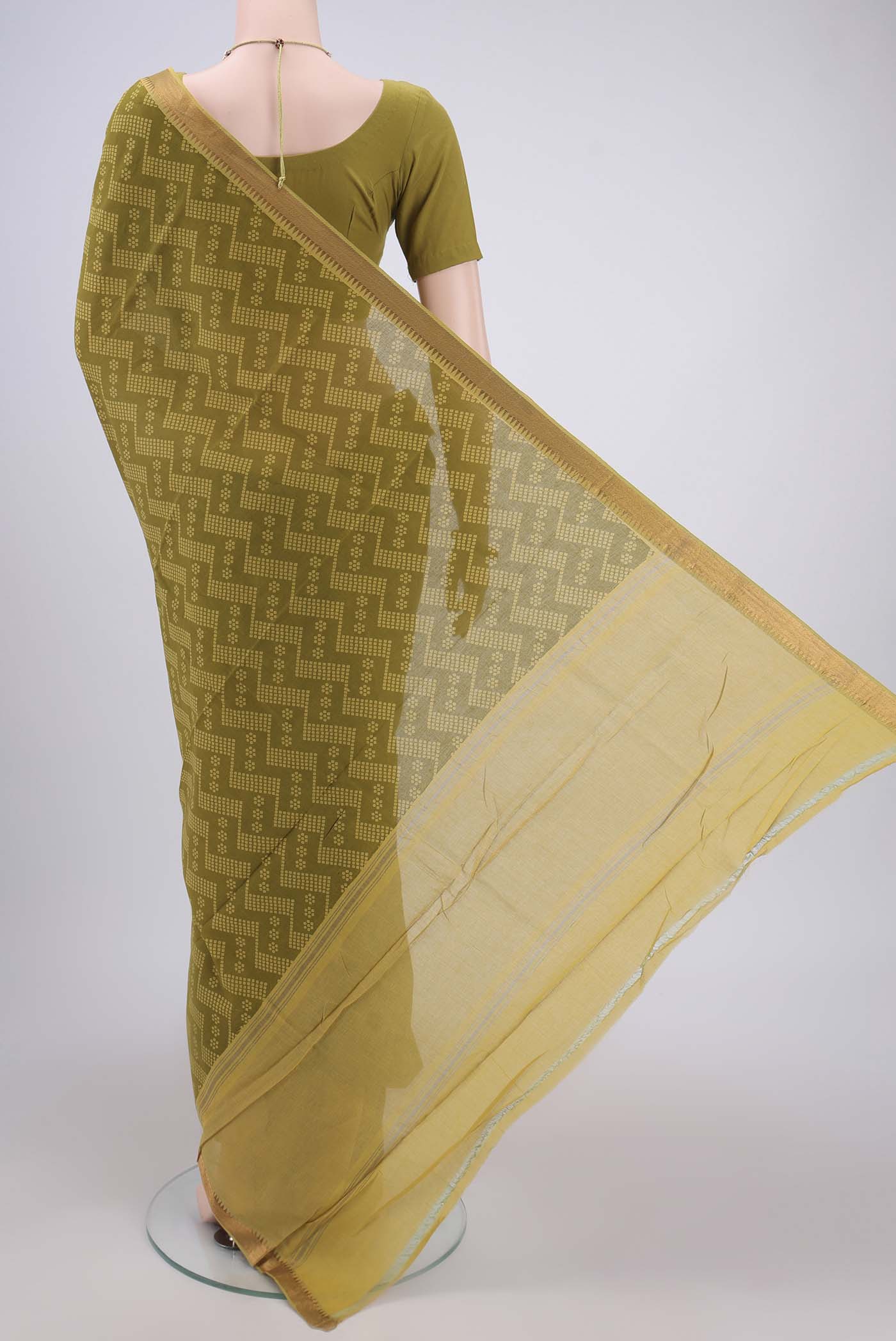 Flat view of Mehandi Green Mangalagiri Cotton Saree with Printed design on the body and Zari Border. 