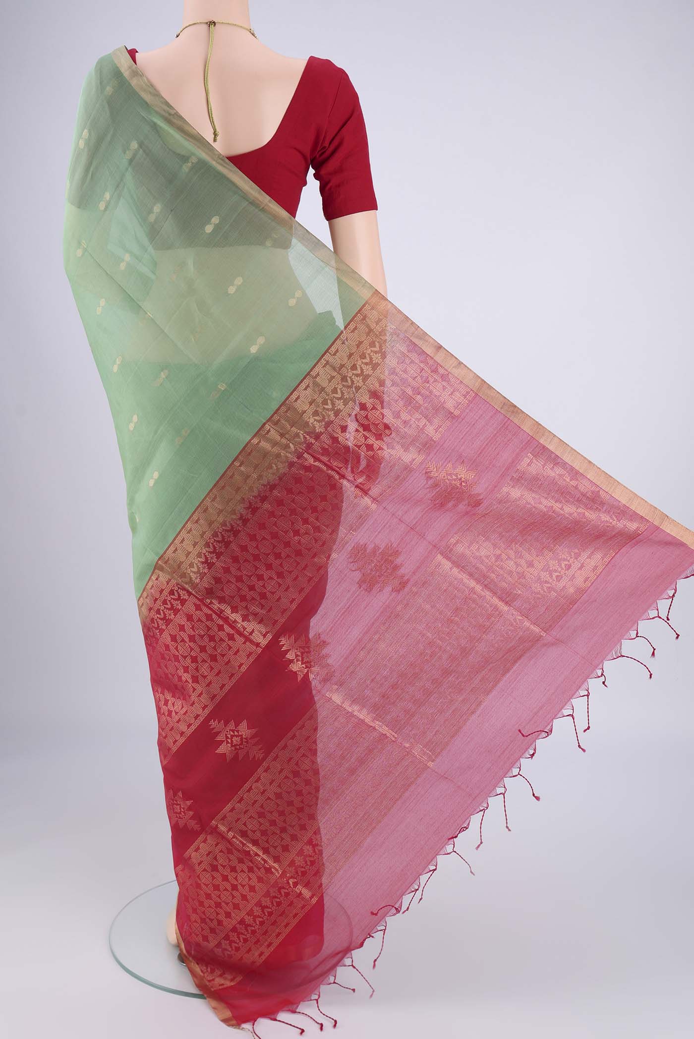 Flat view of Sea Green Silk Cotton Saree with Zari Brocade on the body and Zari Border. 