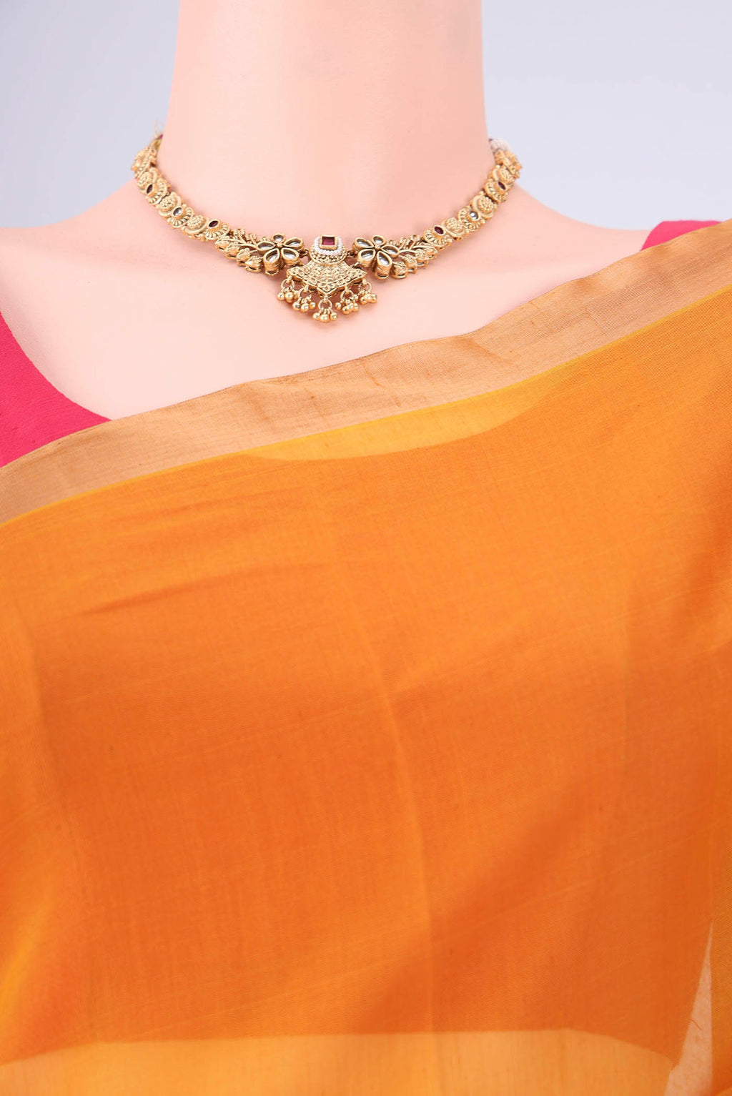 Border image of Mustard Silk Cotton Saree with Zari Brocade on the body and Zari Border. 