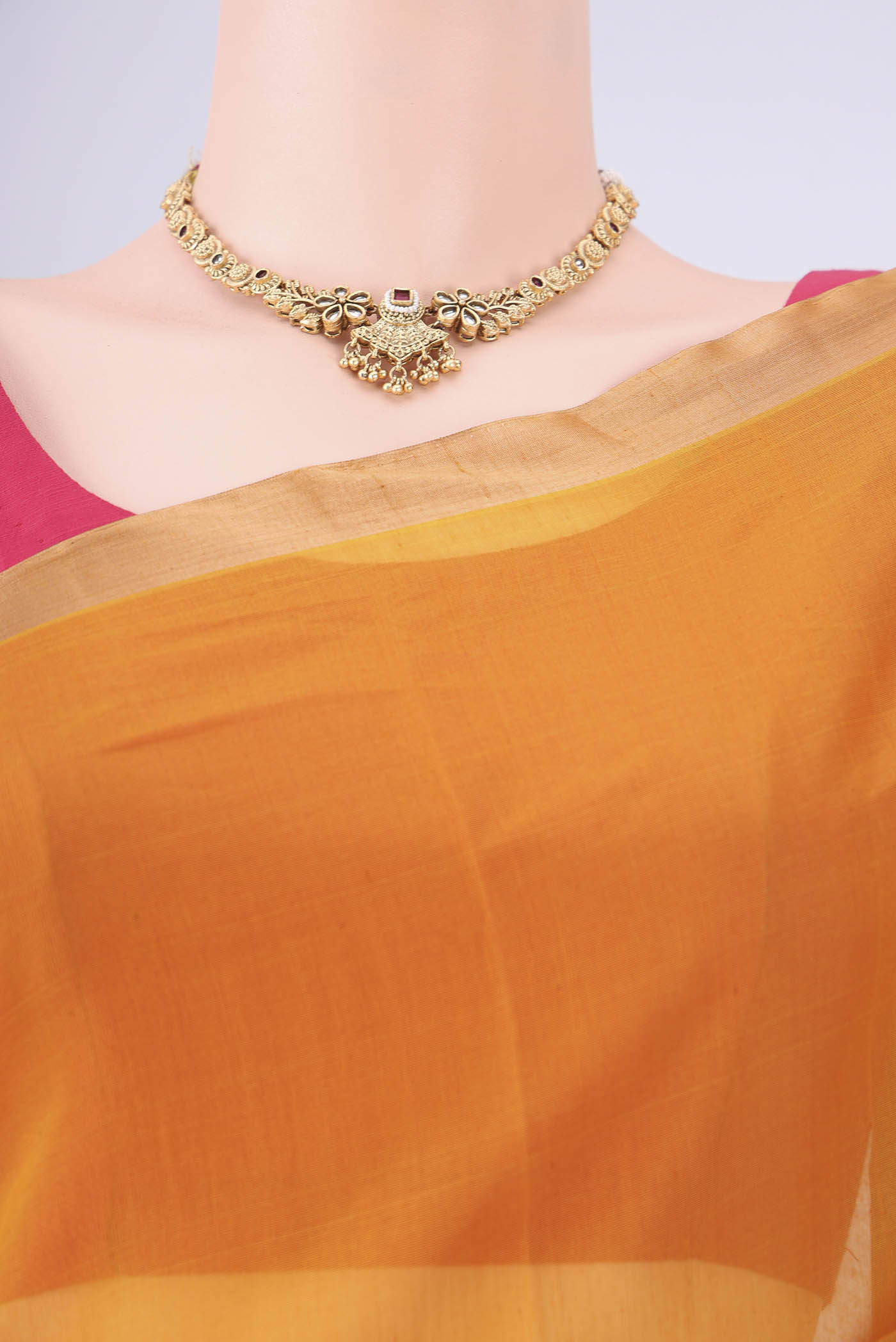 Border image of Mustard Silk Cotton Saree with Zari Brocade on the body and Zari Border. 