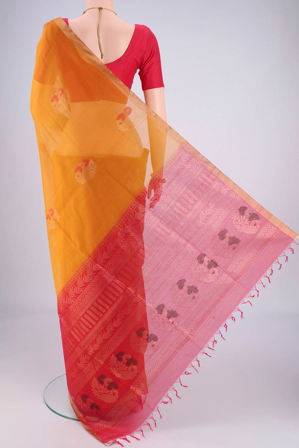 Flat view of Mustard Silk Cotton Saree with Zari Brocade on the body and Zari Border. 