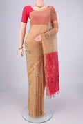 Beige Silk Cotton Saree with Zari Brocade on the body and Zari Border.  displayed on a mannequin