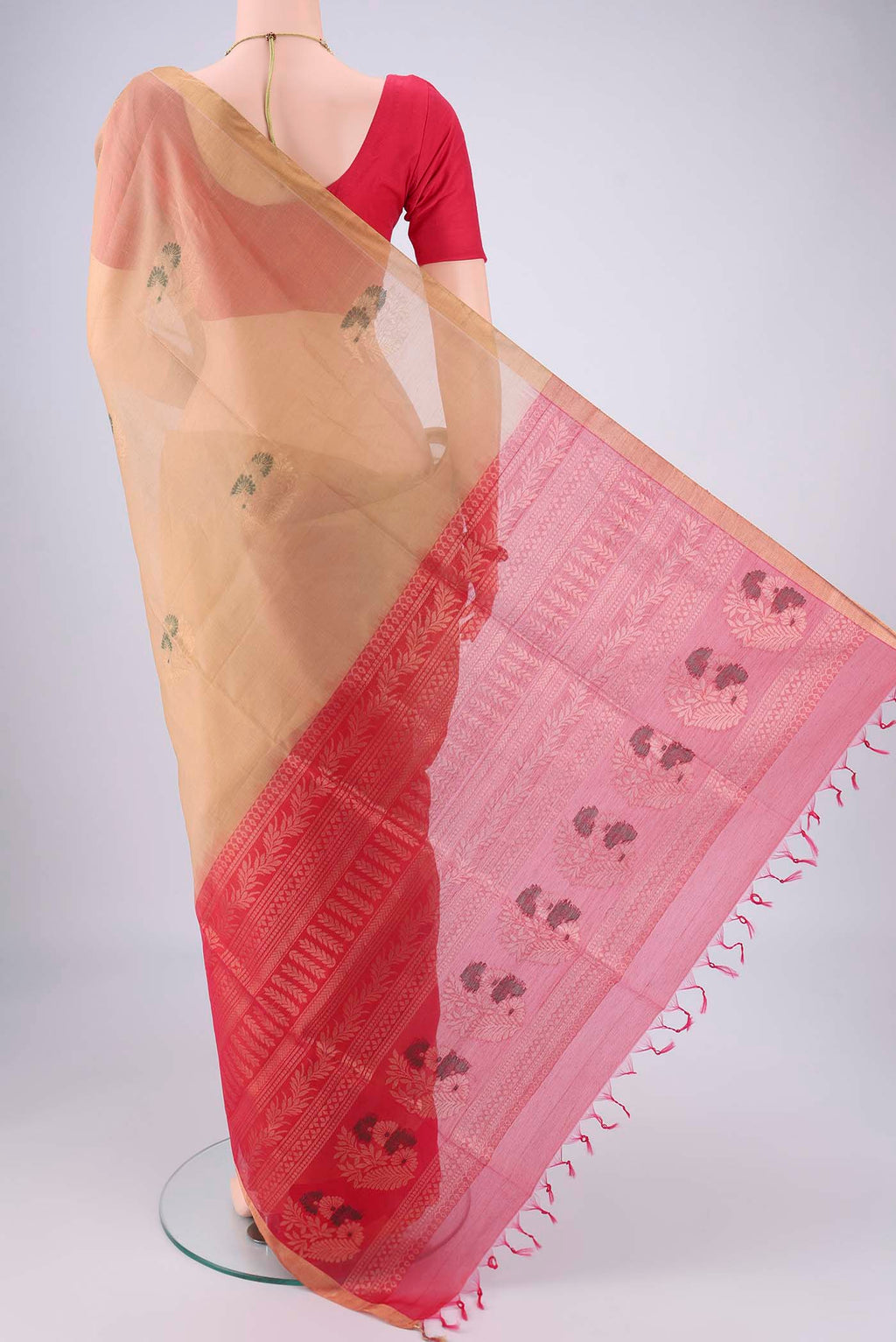 Flat view of Beige Silk Cotton Saree with Zari Brocade on the body and Zari Border. 
