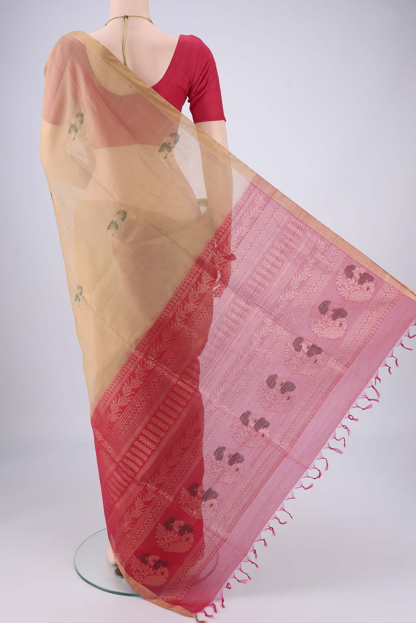 Flat view of Beige Silk Cotton Saree with Zari Brocade on the body and Zari Border. 