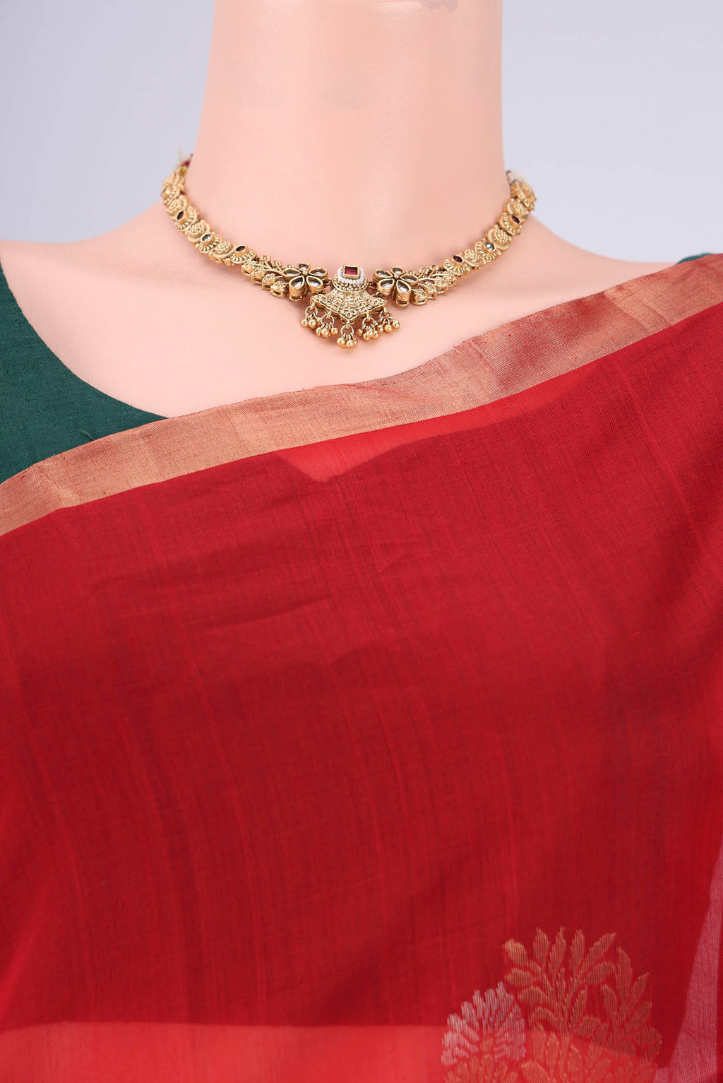 Border image of Red Silk Cotton Saree with Zari Brocade on the body and Zari Border. 