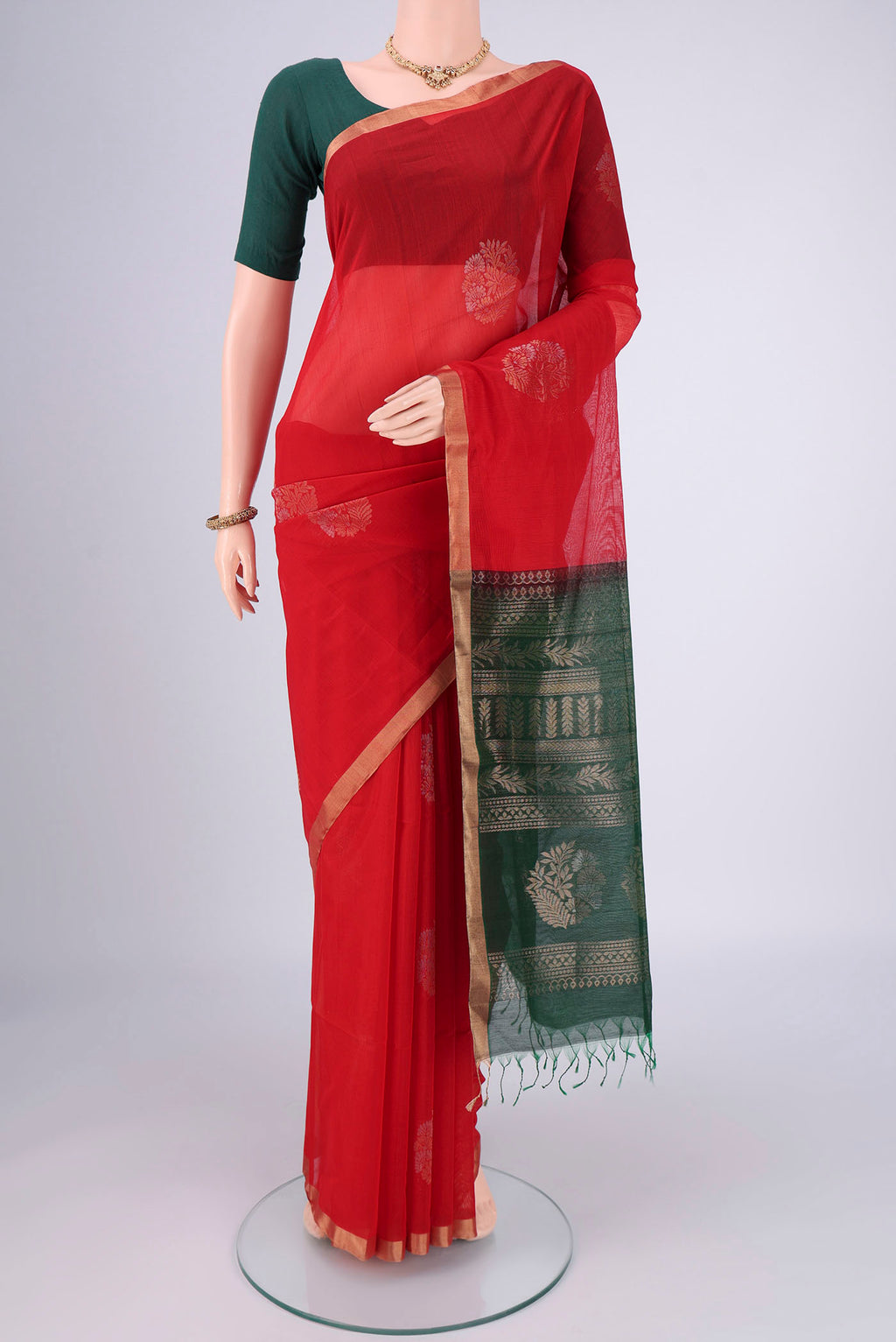 Red Silk Cotton Saree with Zari Brocade on the body and Zari Border.  displayed on a mannequin