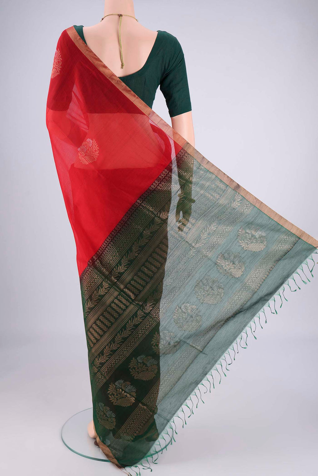 Flat view of Red Silk Cotton Saree with Zari Brocade on the body and Zari Border. 