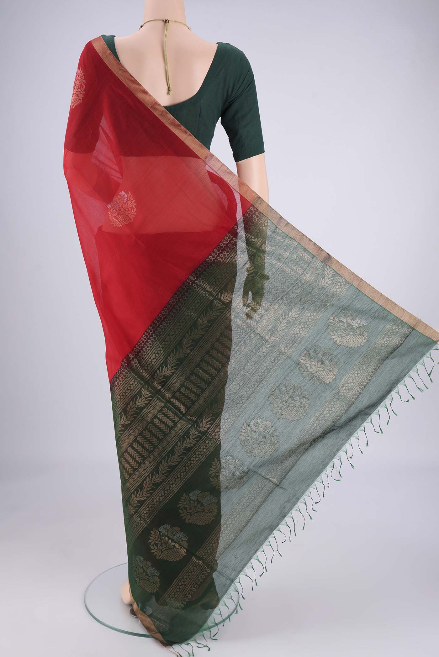 Flat view of Red Silk Cotton Saree with Zari Brocade on the body and Zari Border. 
