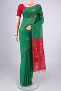 Green Silk Cotton Saree with Zari Brocade on the body and Zari Border.  displayed on a mannequin
