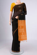 Black Silk Cotton Saree with Zari Butta on the body and Zari Border.  displayed on a mannequin