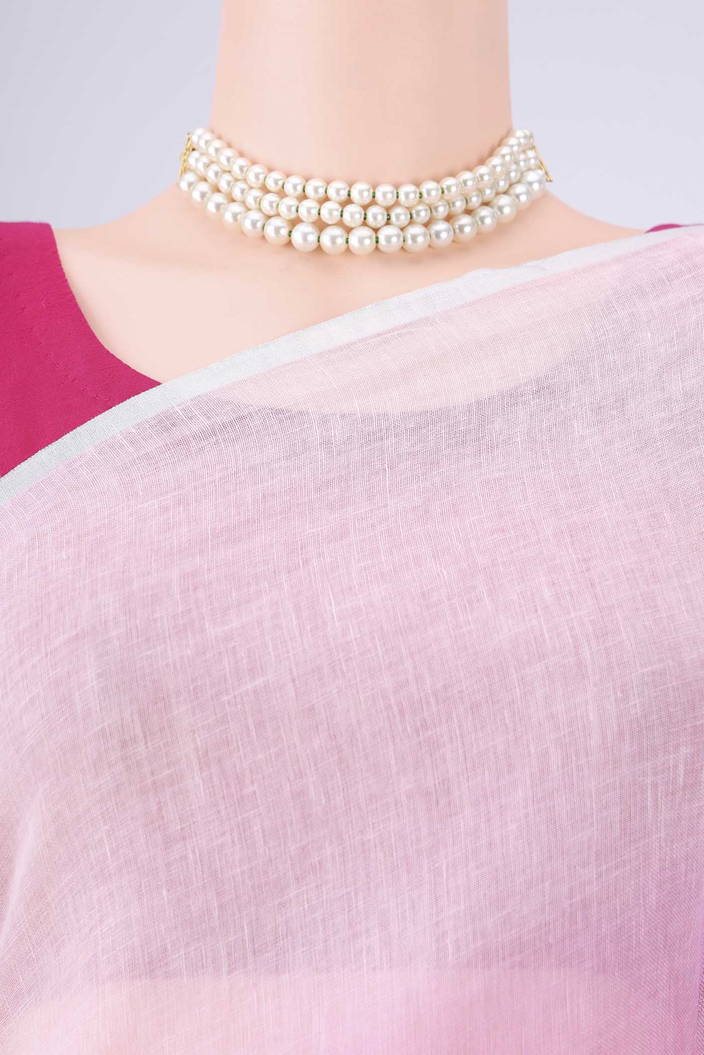 Border image of Rose pink Linen Saree with Half And Half on the body and Thin Zari Line. 
