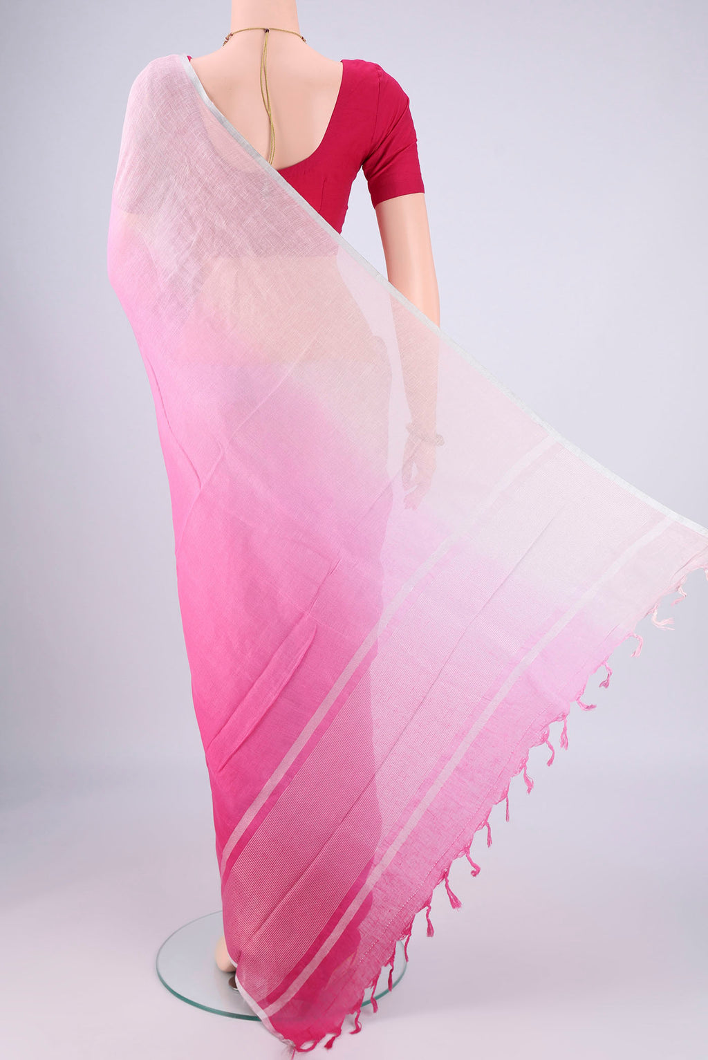 Flat view of Rose pink Linen Saree with Half And Half on the body and Thin Zari Line. 