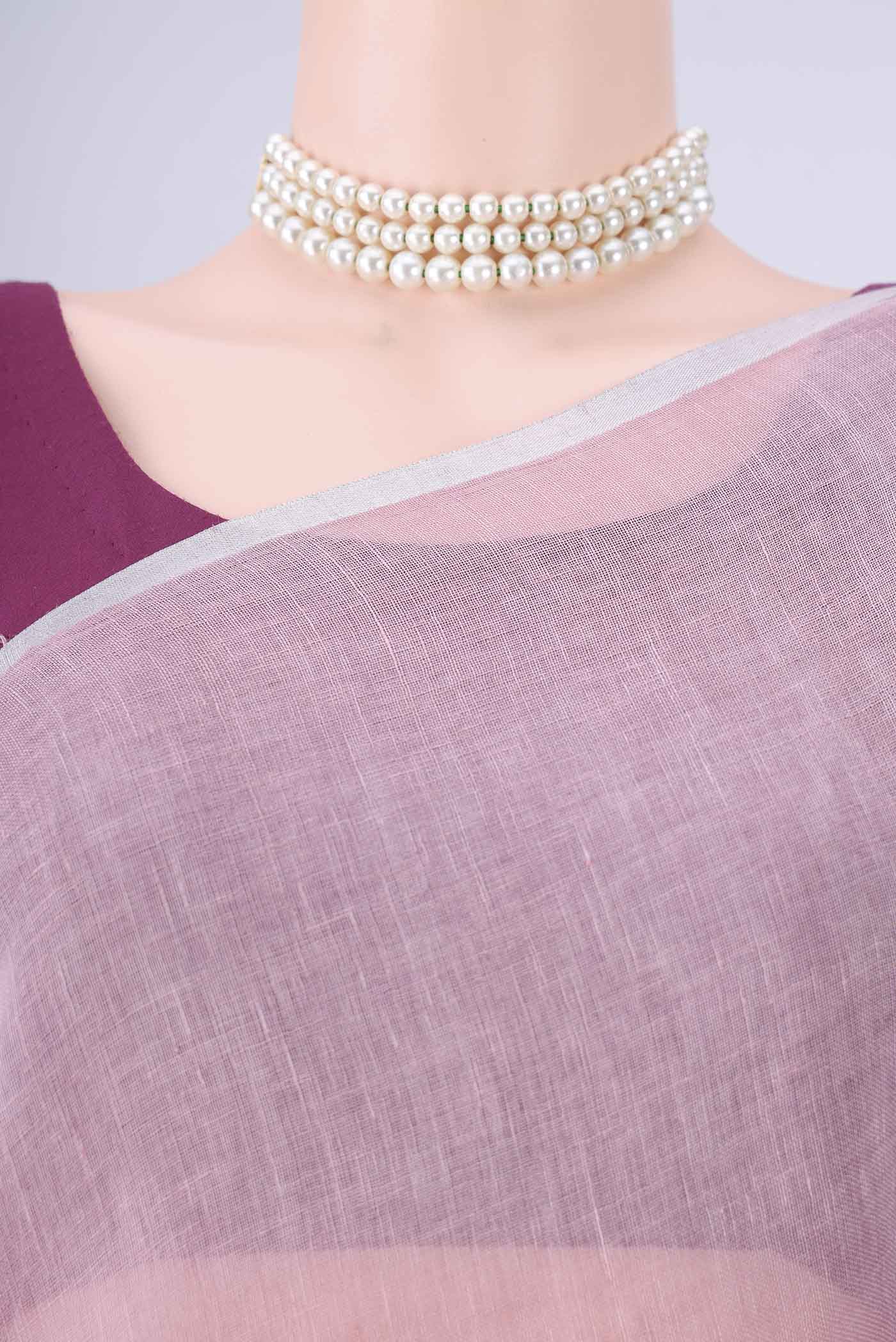 Border image of Mauve Linen Saree with Plain Body and Zari Border. 