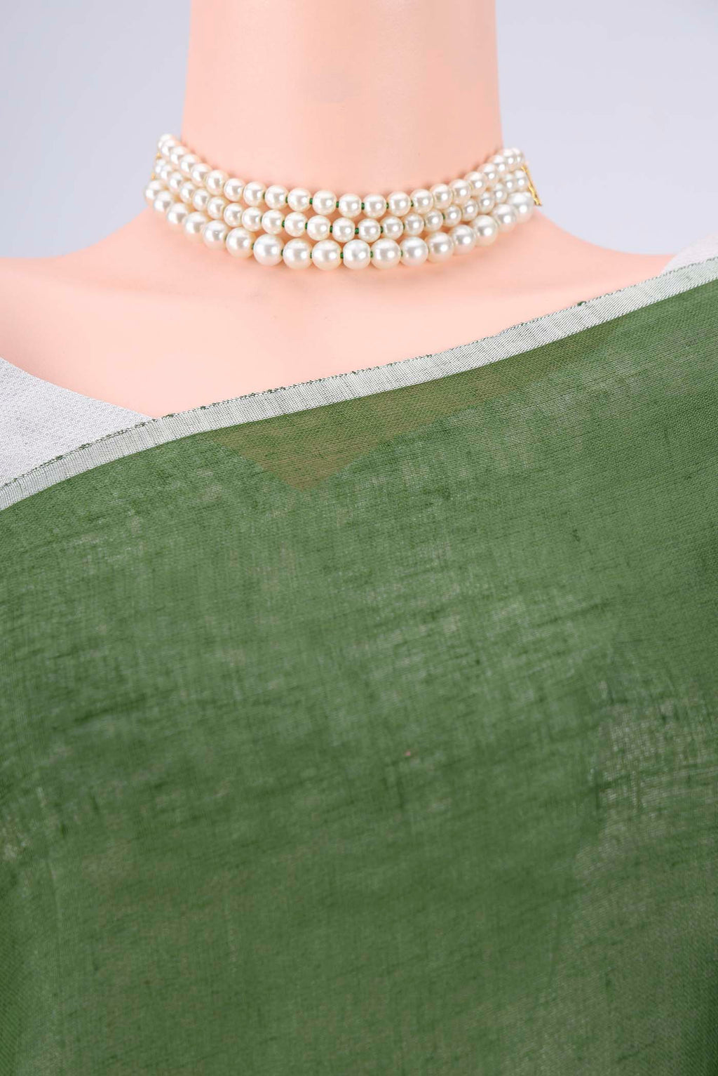 Border image of Light Green Linen Saree with Half And Half on the body and Thin Zari Line. 