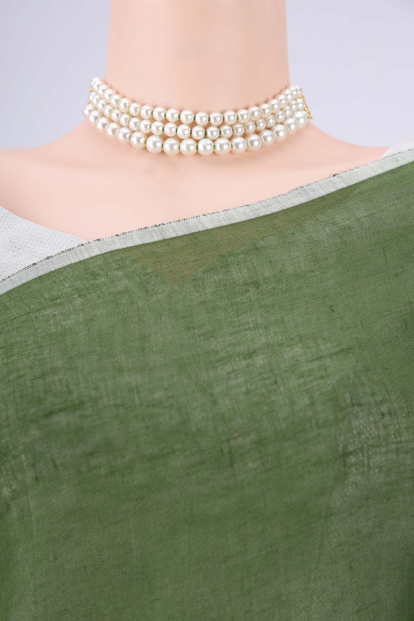 Border image of Light Green Linen Saree with Half And Half on the body and Thin Zari Line. 