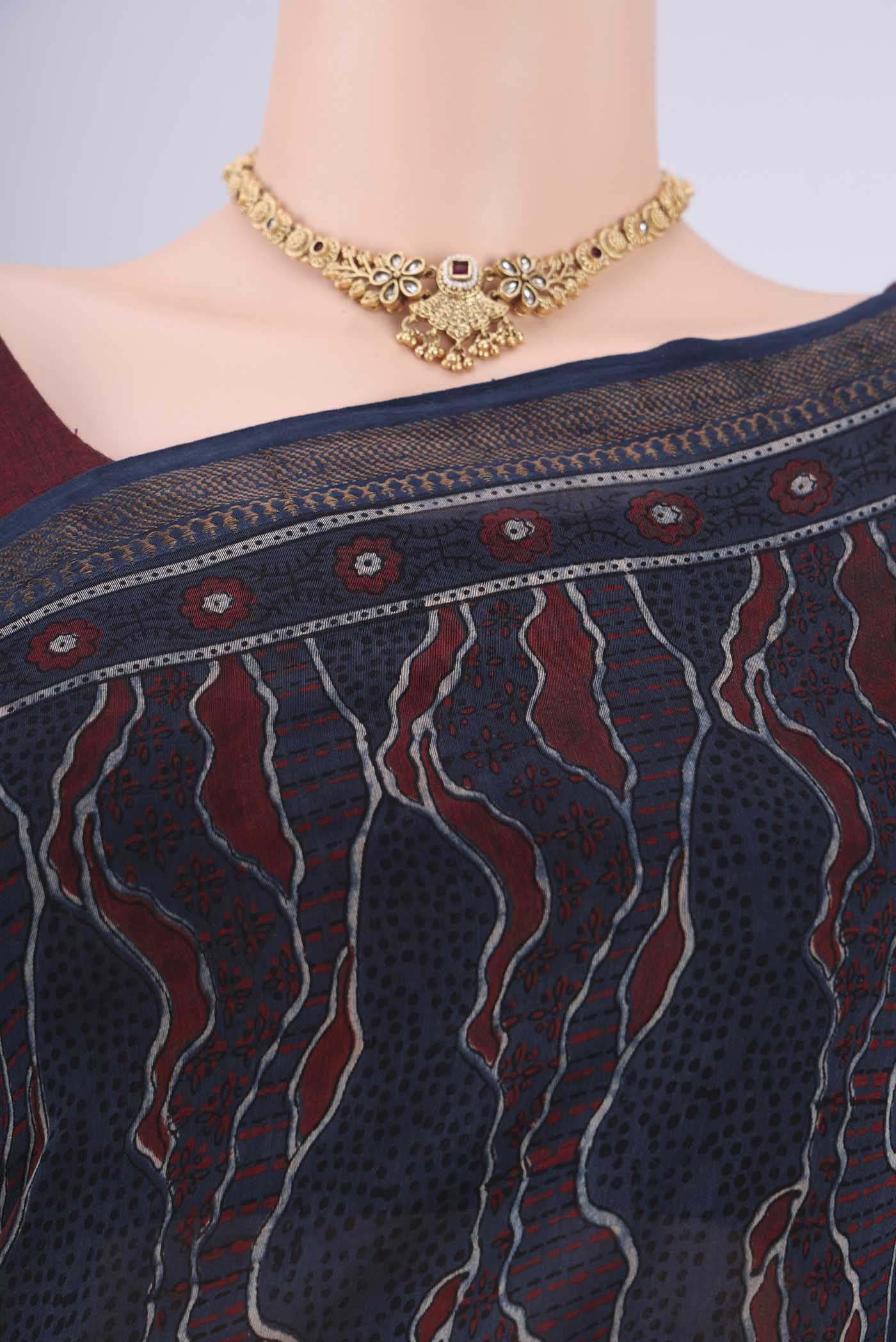 Border image of Navy Blue Chanderi Silk Cotton Saree with Ajrakh Print on the body and Zari Border. 
