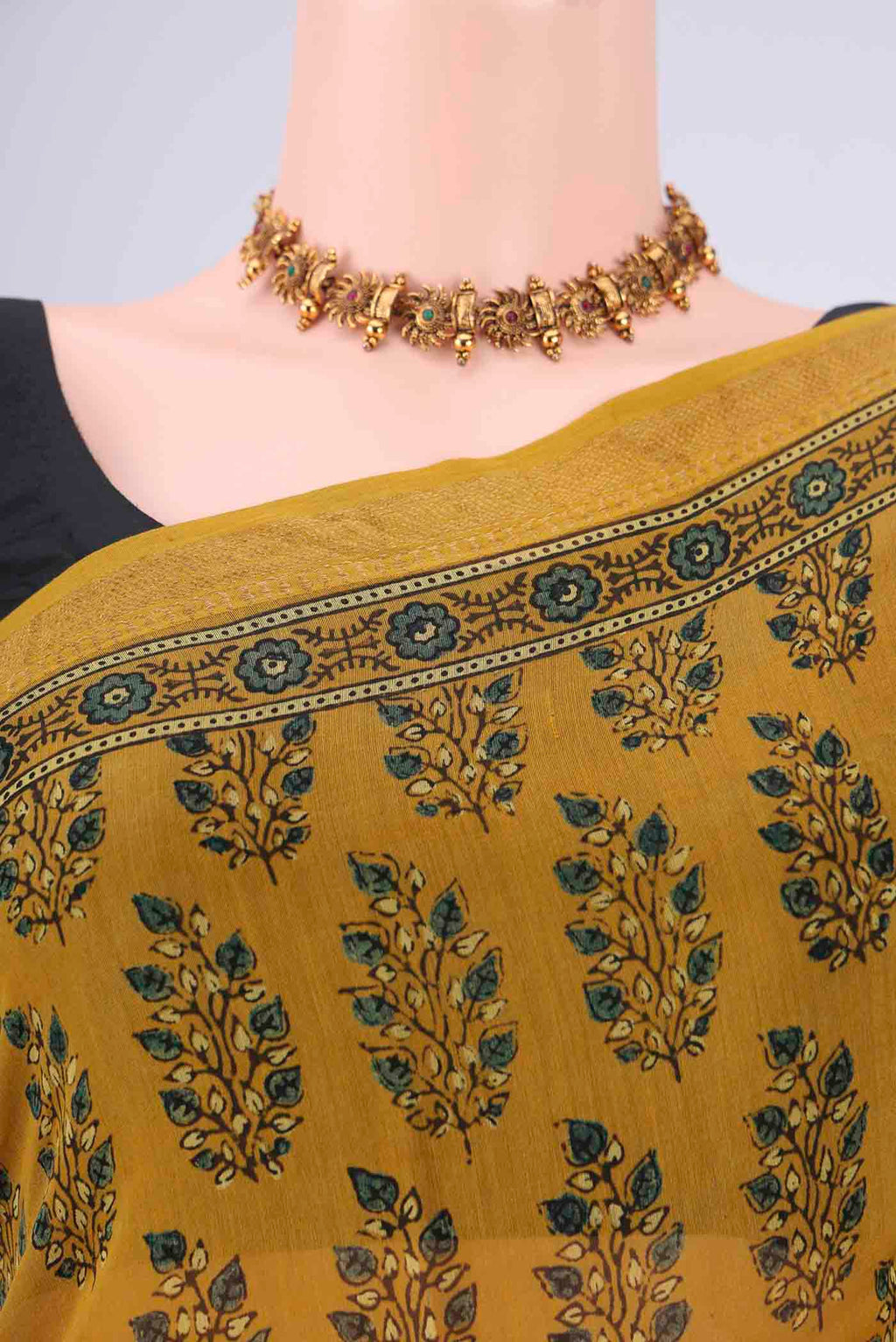 Border image of Mustard Chanderi Silk Cotton Saree with Ajrakh Print on the body and Zari Border. 