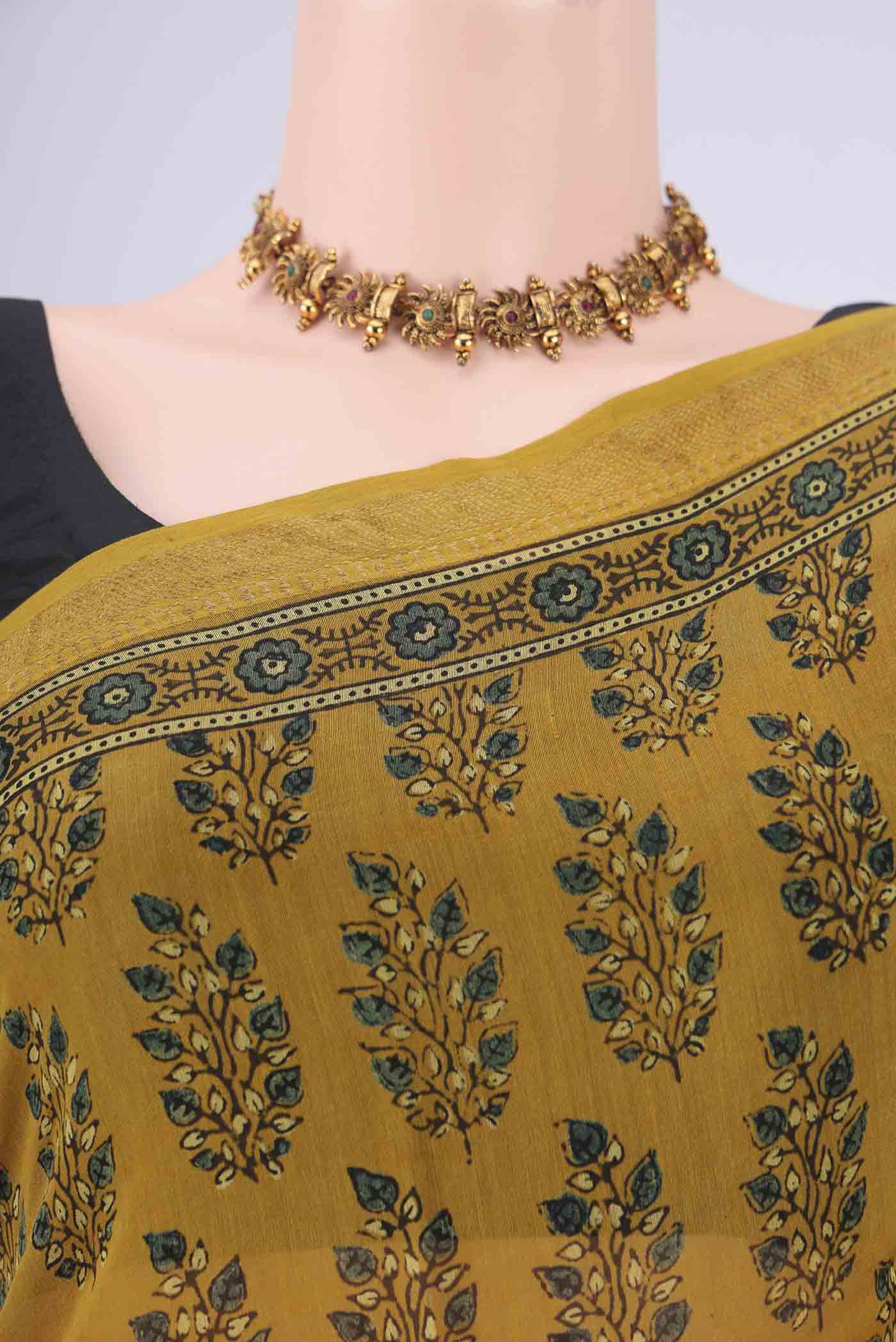 Border image of Mustard Chanderi Silk Cotton Saree with Ajrakh Print on the body and Zari Border. 