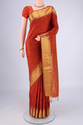 Rust Soft Silk Saree with Jacquard With Thread Butta on the body and Zari Border.  displayed on a mannequin