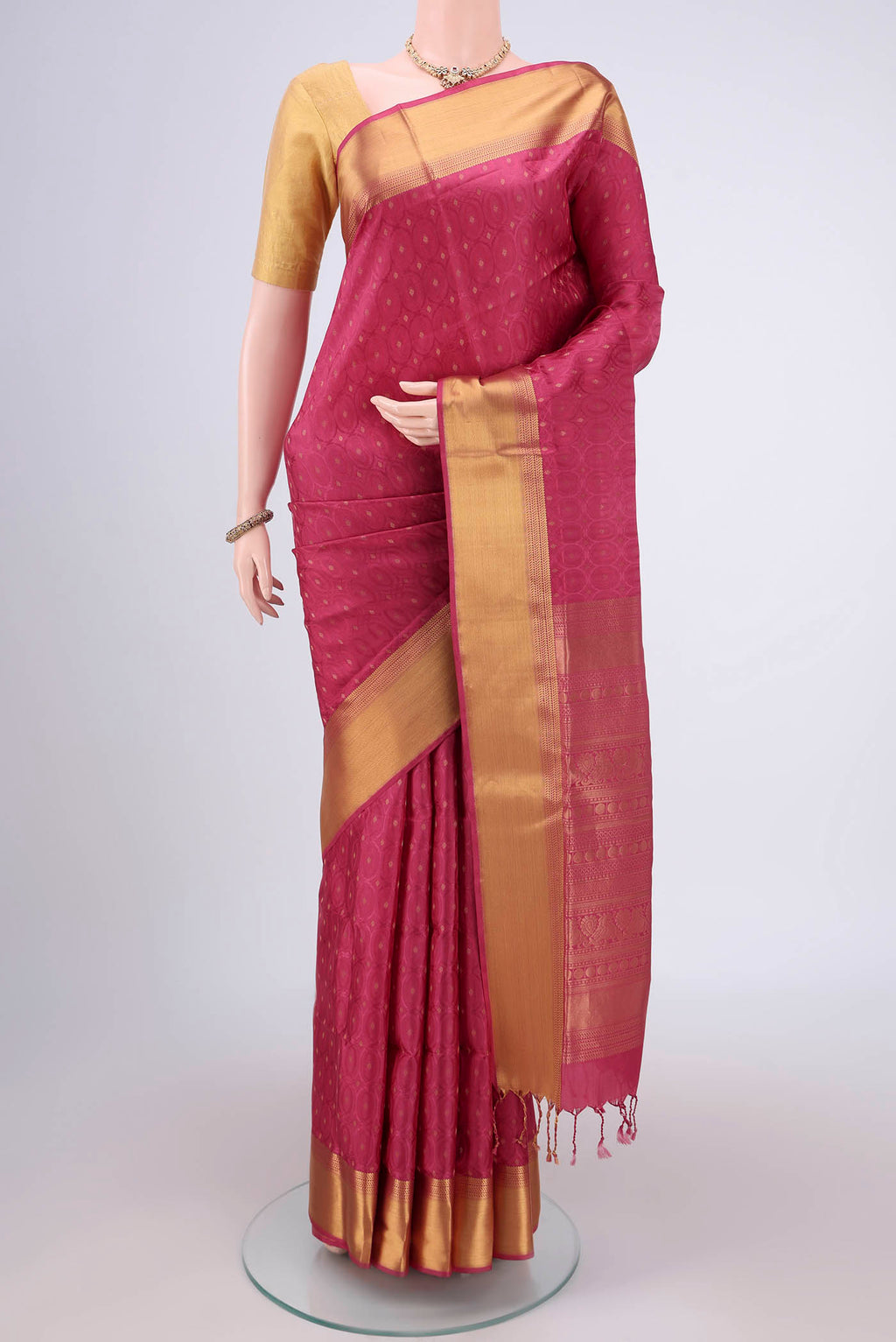 Pink Baluchari Silk Saree with Jacquard With Thread Butta on the body and Zari Border.  displayed on a mannequin