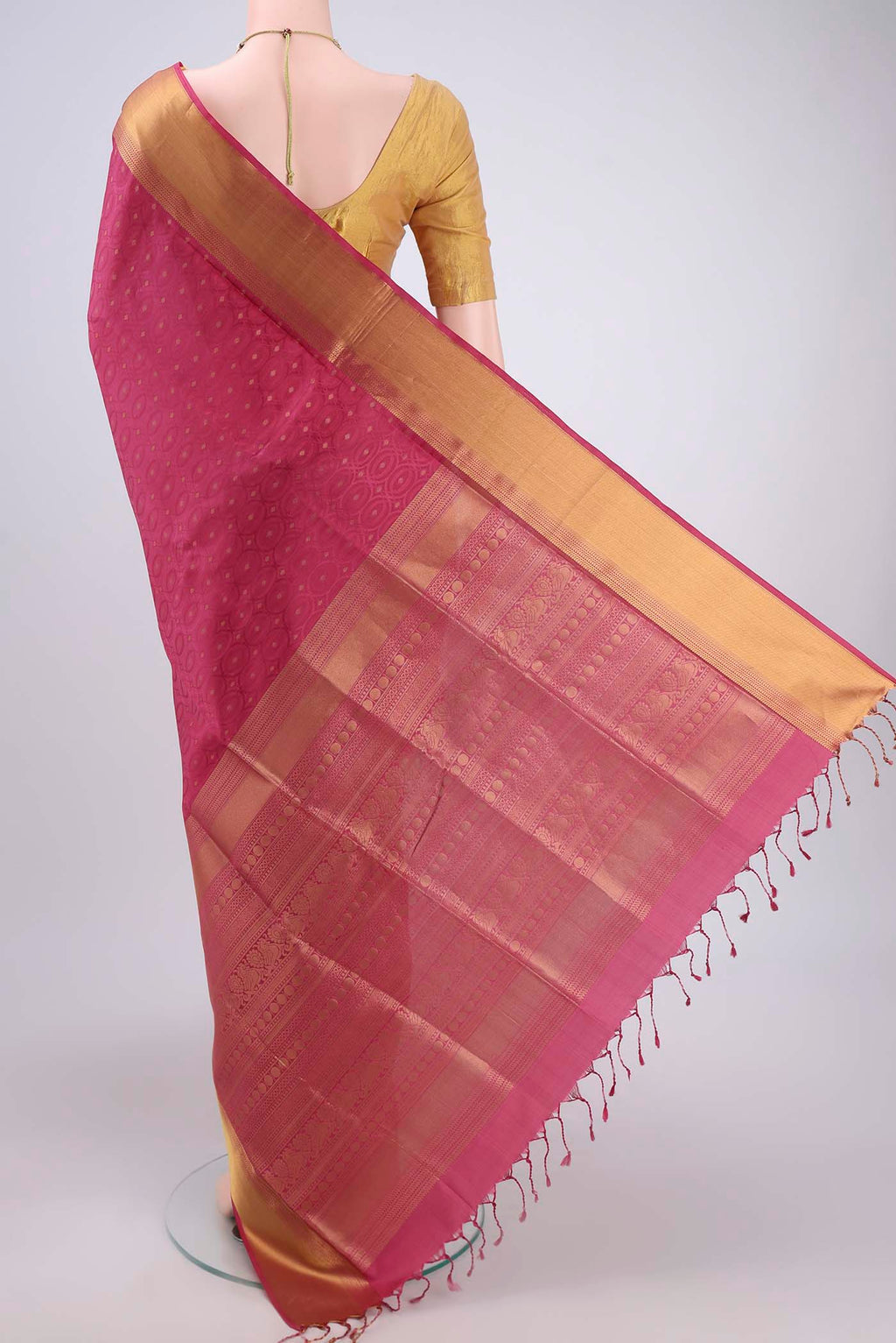 Flat view of Pink Baluchari Silk Saree with Jacquard With Thread Butta on the body and Zari Border. 