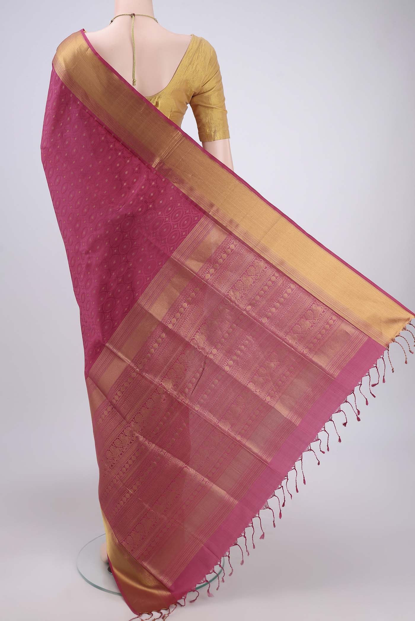 Flat view of Pink Baluchari Silk Saree with Jacquard With Thread Butta on the body and Zari Border. 