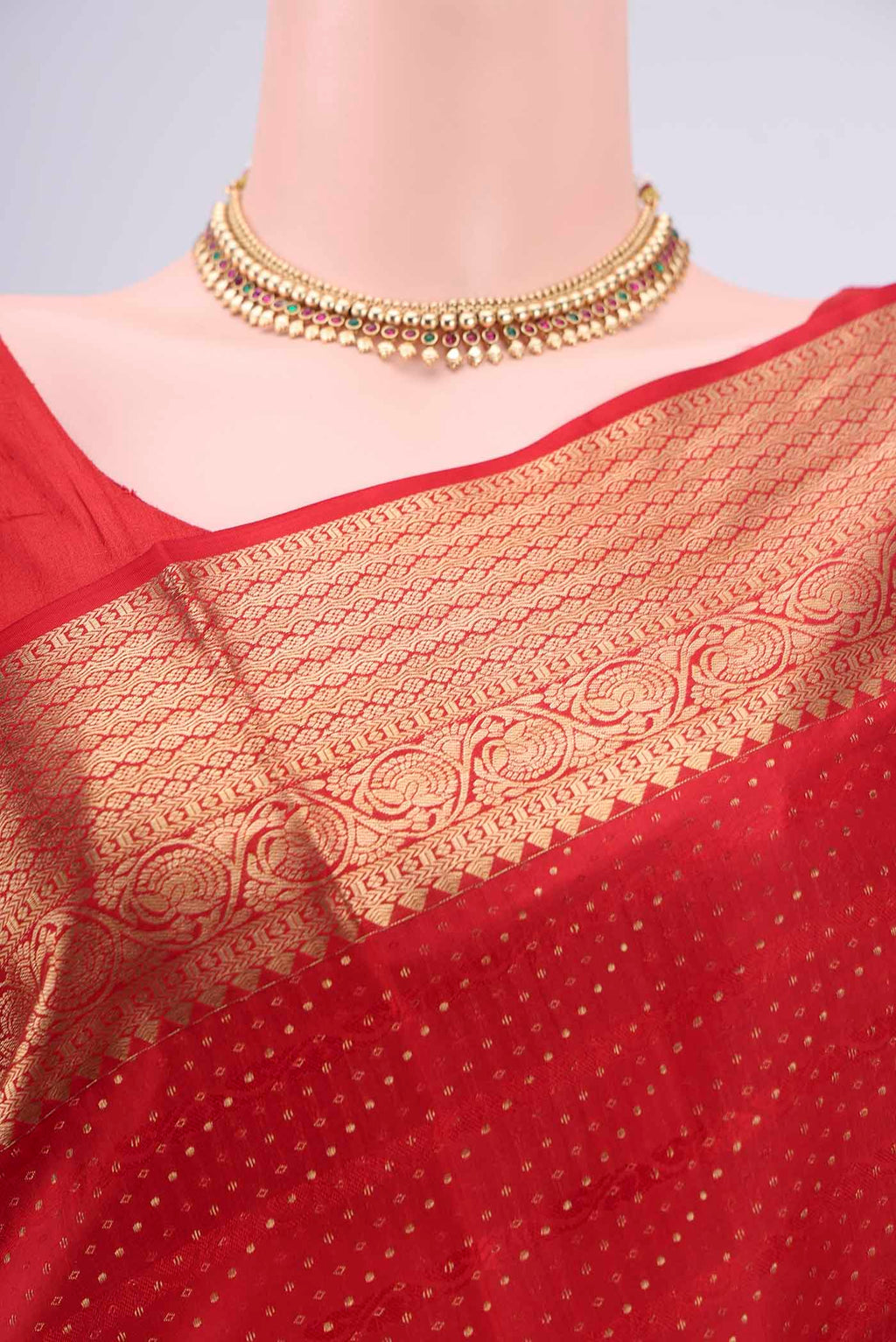 Border image of Red Baluchari Silk Saree with Jacquard With Zari Butta on the body and Zari Border. 