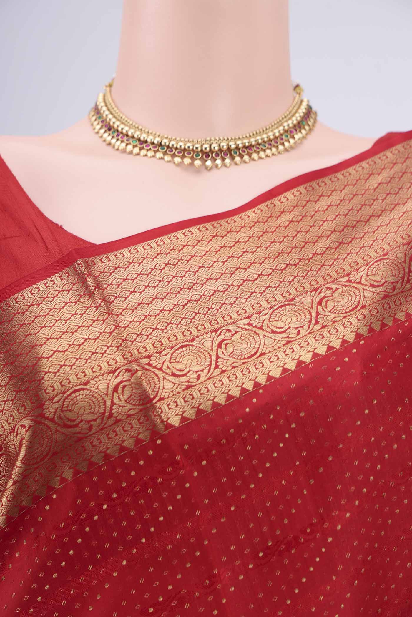 Border image of Red Baluchari Silk Saree with Jacquard With Zari Butta on the body and Zari Border. 