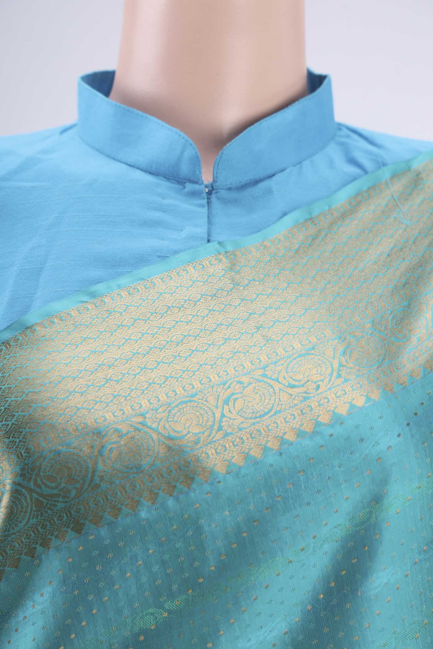 Border image of Turquoise Dual Tone Baluchari Silk Saree with Jacquard With Zari Butta on the body and Zari Border. 