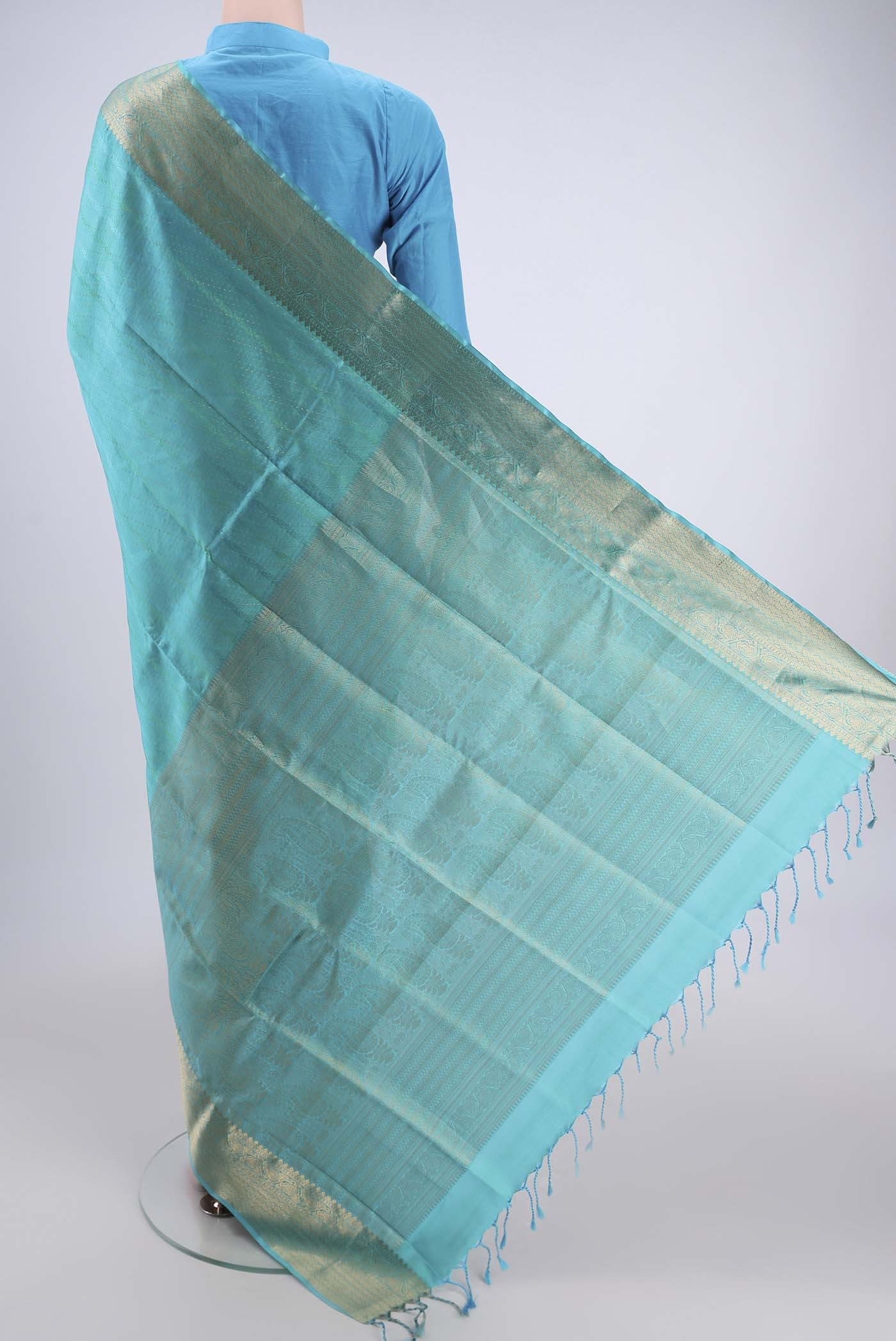 Flat view of Turquoise Dual Tone Baluchari Silk Saree with Jacquard With Zari Butta on the body and Zari Border. 